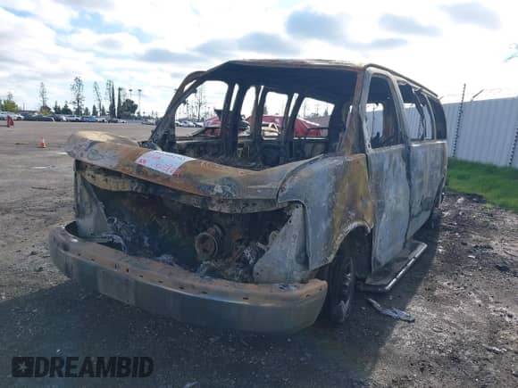 2005 Chevrolet Express Passenger with VIN 1GAHG35U251245243, listed as a IAAI auction lot 41208192 with Not provided miles and . Bid and sale history available at DreamBid. Image 2.