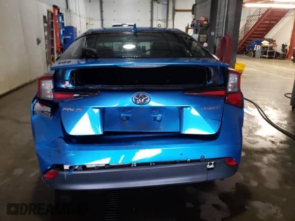 2020 Toyota Prius L Eco with VIN JTDKARFUXL3110965, listed as a Copart auction lot 81241595 with 94,776 mi miles and Clean title. Bid and sale history available at DreamBid. Image 6.