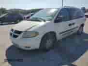 2005 Dodge Caravan SE with VIN 1D4GP24R35B211707, listed as a Copart auction lot 80374575 with 157,246 mi miles and Salvage title. Bid and sale history available at DreamBid. Image 1.
