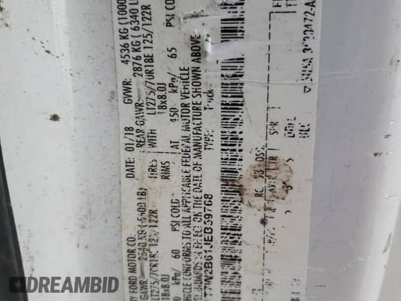 2018 Ford F-250 XL with VIN 1FT7W2B61JEB59768, listed as a Copart auction lot 82266435 with 220,401 mi miles and Salvage title. Bid and sale history available at DreamBid. Image 12.