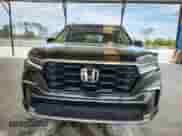 2024 Honda Pilot Touring с VIN 5FNYG2H74RB012467, выставлен на аукционе Copart как лот 58203785 с пробегом 80 924 миль миль и Списание • Salvage title. История ставок и продаж доступна на DreamBid. Изображение 5.