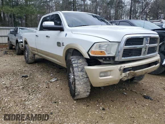 2012 Dodge RAM с VIN 3C6UD5LL4CG338615, выставлен на аукционе Copart как лот 45263175 с пробегом 232 166 миль миль и Списание • Salvage title. История ставок и продаж доступна на DreamBid. Изображение 4.