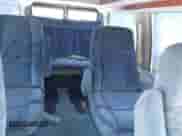 1993 Chevrolet Chevy Van z VIN 1GBEG25K5PF330218, wystawiony jako IAAI lot #42321737 z przebiegiem 203 157 mil mil oraz . Historia ofert i sprzedaży dostępna na DreamBid. Obrazek 8.