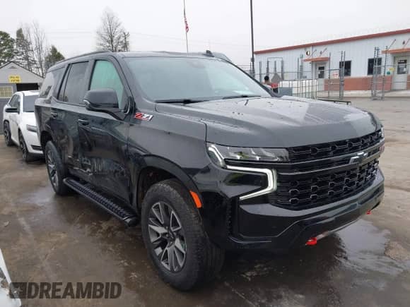 2023 Chevrolet Tahoe Z71 with VIN 1GNSKPKD8PR212704, listed as a IAAI auction lot 41294229 with 31,768 mi miles and . Bid and sale history available at DreamBid. Image 13.