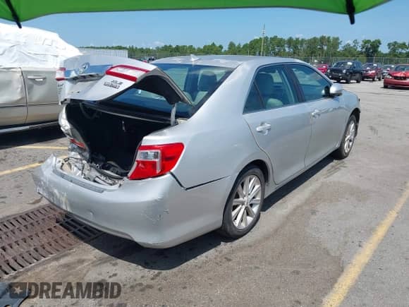 2012 Toyota Camry SE with VIN 4T1BK1FK5CU513674, listed as a IAAI auction lot 42996159 with 243,583 mi miles and . Bid and sale history available at DreamBid. Image 4.