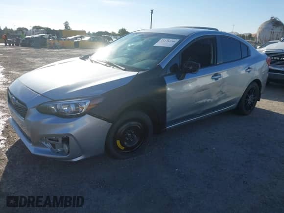 2017 Subaru Impreza Premium with VIN 4S3GKAD68H3611434, listed as a IAAI auction lot 43128256 with 145,290 mi miles and . Bid and sale history available at DreamBid. Image 2.