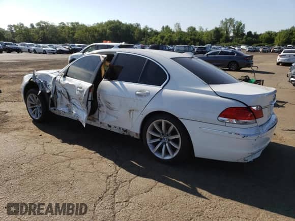 2007 BMW 7 Series 750i with VIN WBAHL83557DT09351, listed as a Copart auction lot 67655695 with 118,311 mi miles and Salvage title. Bid and sale history available at DreamBid. Image 2.