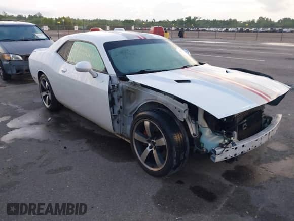 2013 Dodge Challenger SRT-8 with VIN 2C3CDYCJ4DH528280, listed as a IAAI auction lot 40224305 with 101,051 mi miles and . Bid and sale history available at DreamBid. Image 1.