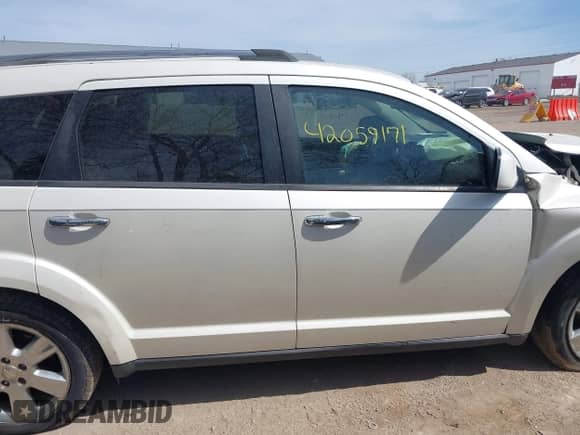 2013 Dodge Journey Crew with VIN 3C4PDDDGXDT590038, listed as a IAAI auction lot 42059171 with 185,632 mi miles and . Bid and sale history available at DreamBid. Image 14.