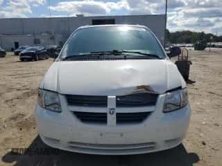 2005 Dodge Caravan SXT z VIN 1D4GP45R75B164448, wystawiony jako Copart lot #84948935 z przebiegiem 114 743 mil mil oraz Szkoda całkowita • Salvage title. Historia ofert i sprzedaży dostępna na DreamBid. Obrazek 5.