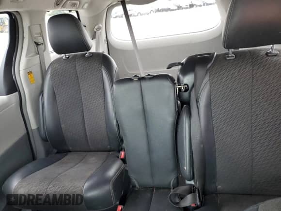2014 Toyota Sienna SE with VIN 5TDXK3DCXES431576, listed as a Copart auction lot 69655795 with 221,877 mi miles and Salvage title. Bid and sale history available at DreamBid. Image 10.
