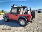 2001 Jeep Wrangler SE with VIN 1J4FA29P31P332021, listed as a Copart auction lot 91076825 with Not provided miles and Clean title. Bid and sale history available at DreamBid. Image 2.