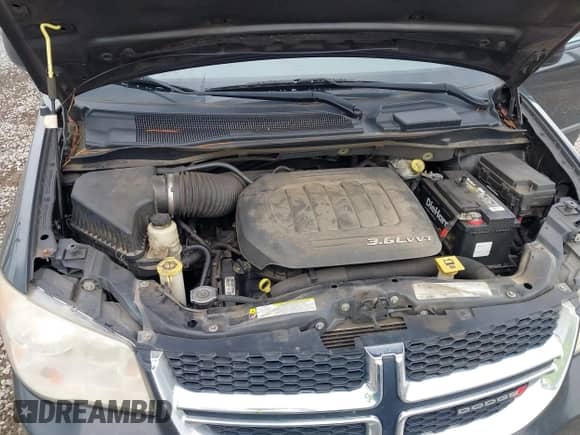 2012 Dodge Grand Caravan SE z VIN 2C4RDGBG9CR285810, wystawiony jako IAAI lot #43317721 z przebiegiem 162 753 mil mil oraz . Historia ofert i sprzedaży dostępna na DreamBid. Obrazek 10.