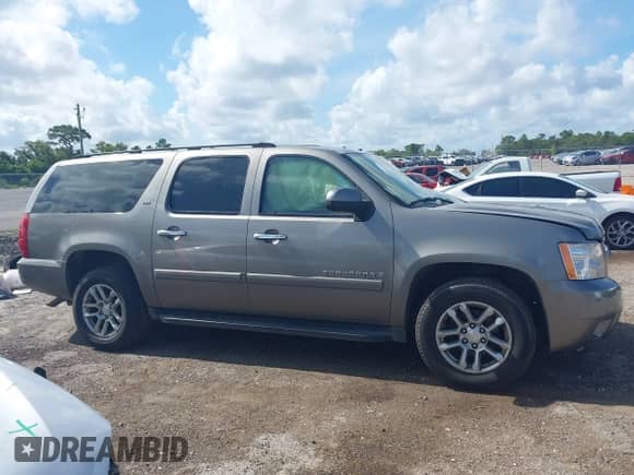 2007 Chevrolet Suburban LS with VIN 1GNFC16J77R260500, listed as a IAAI auction lot 42787990 with 167,163 mi miles and . Bid and sale history available at DreamBid. Image 14.