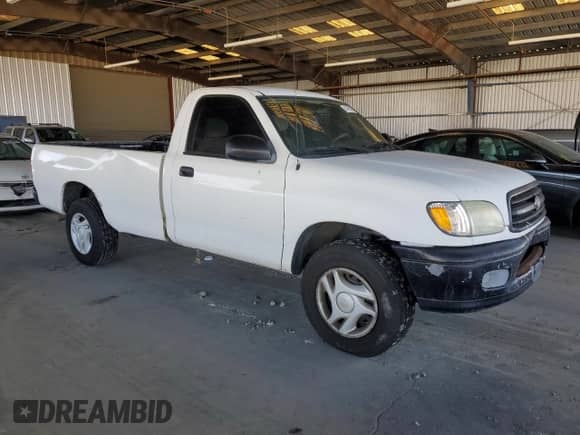 2002 Toyota Tundra z VIN 5TBJN32142S303241, wystawiony jako Copart lot #64789225 z przebiegiem 216 962 mil mil oraz Czysty tytuł • Clean title. Historia ofert i sprzedaży dostępna na DreamBid. Obrazek 4.
