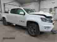 2020 Chevrolet Colorado 4WD Work Truck with VIN 1GCGTBEN1L1160859, listed as a IAAI auction lot 42605808 with 61,852 mi miles and . Bid and sale history available at DreamBid. Image 1.