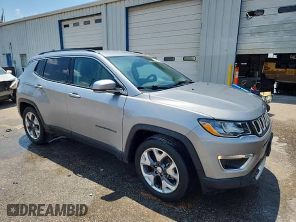 2020 Jeep Compass Limited with VIN 3C4NJCCB2LT187511, listed as a Copart auction lot 63769235 with 100,436 mi miles and Salvage title. Bid and sale history available at DreamBid. Image 4.