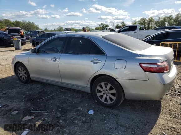 2007 Toyota Camry LE с VIN 4T1BK46K47U524897, выставлен на аукционе Copart как лот 84573195 с пробегом 306 736 миль миль и Списание • Salvage title. История ставок и продаж доступна на DreamBid. Изображение 2.