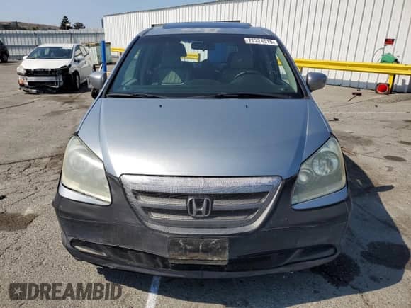 2007 Honda Odyssey EX-L z VIN 5FNRL38637B043607, wystawiony jako Copart lot #70324515 z przebiegiem 193 337 mil mil oraz Szkoda całkowita • Salvage title. Historia ofert i sprzedaży dostępna na DreamBid. Obrazek 5.