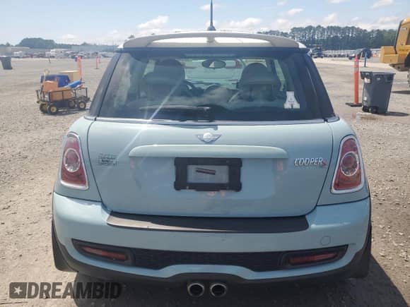 2013 MINI Hardtop S with VIN WMWSV3C50DT392465, listed as a Copart auction lot 58340735 with 40,731 mi miles and Salvage title. Bid and sale history available at DreamBid. Image 6.