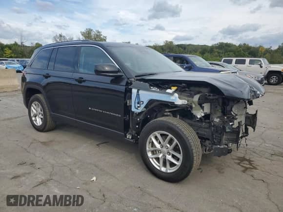 2023 Jeep Grand Cherokee Laredo with VIN 1C4RJHAG7PC548195, listed as a Copart auction lot 80794395 with 25,634 mi miles and Salvage title. Bid and sale history available at DreamBid. Image 4.
