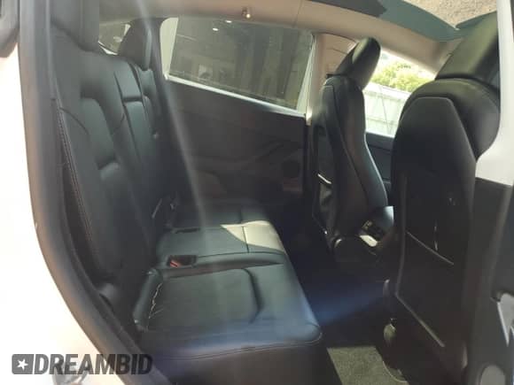 2023 Tesla Model Y Long Range with VIN 7SAYGDEE1PF764576, listed as a Copart auction lot 67882145 with 40,313 mi miles and Salvage title. Bid and sale history available at DreamBid. Image 10.