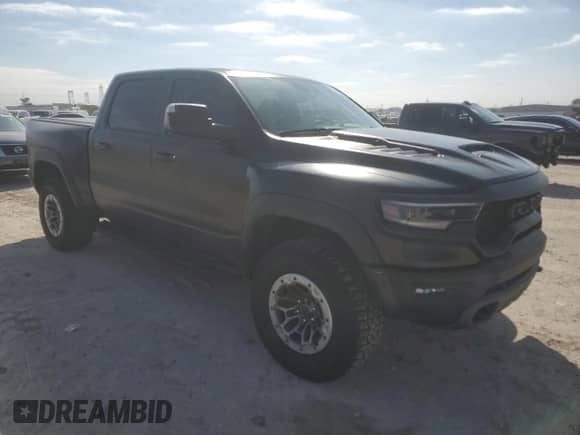 2023 Ram 1500 TRX z VIN 1C6SRFU96PN515714, wystawiony jako Copart lot #88884065 z przebiegiem 15 395 mil mil oraz Szkoda całkowita • Salvage title. Historia ofert i sprzedaży dostępna na DreamBid. Obrazek 4.