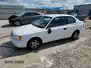 2002 Hyundai Accent GS z VIN KMHCG35C82U230535, wystawiony jako Copart lot #77709454 z przebiegiem 116 200 mil mil oraz Nie do naprawy • Non repairable. Historia ofert i sprzedaży dostępna na DreamBid. Obrazek 1.