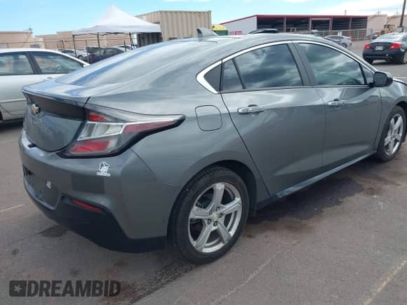 2017 Chevrolet Volt LT z VIN 1G1RA6S56HU119507, wystawiony jako IAAI lot #43145579 z przebiegiem 101 560 mil mil oraz . Historia ofert i sprzedaży dostępna na DreamBid. Obrazek 4.