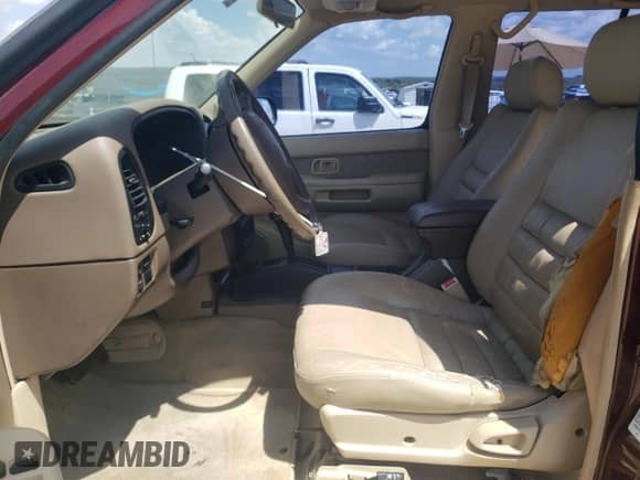 1997 Nissan Pathfinder XE with VIN JN8AR05S4VW157480, listed as a Copart auction lot 67882474 with 107,952 mi miles and Salvage title. Bid and sale history available at DreamBid. Image 7.