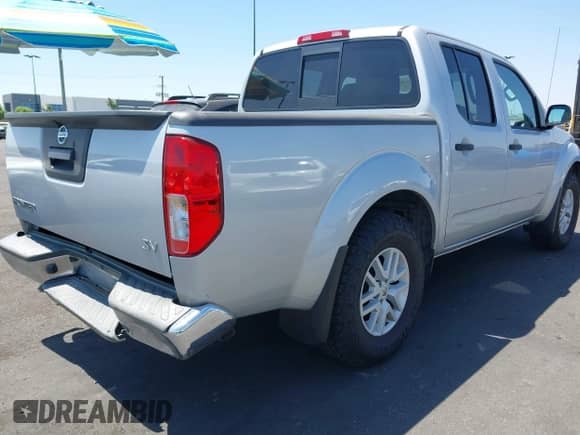 2018 Nissan Frontier SV with VIN 1N6AD0ER5JN739687, listed as a IAAI auction lot 43012851 with 84,692 mi miles and . Bid and sale history available at DreamBid. Image 4.