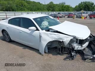 2019 Dodge Charger SXT with VIN 2C3CDXJG7KH758037, listed as a IAAI auction lot 42390328 with 107,200 mi miles and . Bid and sale history available at DreamBid. Image 1.