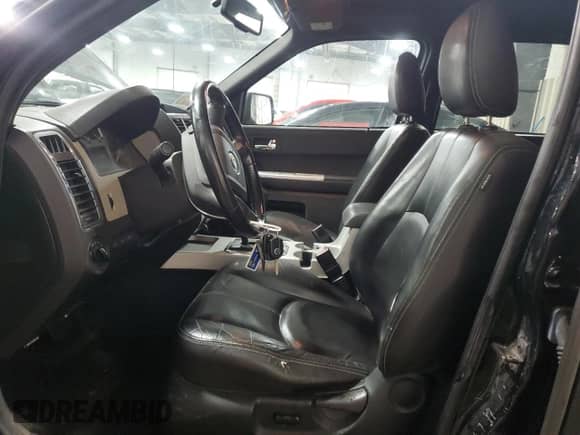 2008 Mercury Mariner Premier with VIN 4M2CU97158KJ36462, listed as a Copart auction lot 85297144 with 187,819 mi miles and Salvage title. Bid and sale history available at DreamBid. Image 7.