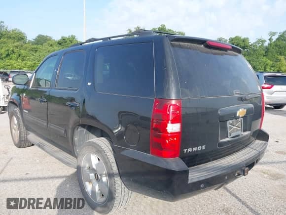 2014 Chevrolet Tahoe LT with VIN 1GNSCBE07ER120098, listed as a IAAI auction lot 42623461 with 166,170 mi miles and . Bid and sale history available at DreamBid. Image 3.