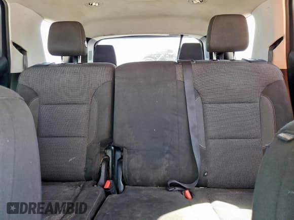 2018 Chevrolet Traverse LS с VIN 1GNERFKW9JJ143404, выставлен на аукционе Copart как лот 71166085 с пробегом 184 666 миль миль и Списание • Salvage title. История ставок и продаж доступна на DreamBid. Изображение 10.