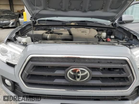 2021 Toyota Tacoma TRD Off Road with VIN 3TMCZ5AN5MM429356, listed as a Copart auction lot 71444135 with 68,728 mi miles and Salvage title. Bid and sale history available at DreamBid. Image 11.
