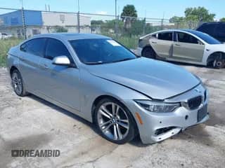 2019 BMW 4 Series 430i xDrive z VIN WBA4J3C50KBL08541, wystawiony jako IAAI lot #43156193 z przebiegiem 109 733 mil mil oraz . Historia ofert i sprzedaży dostępna na DreamBid. Obrazek 1.