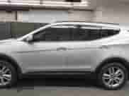 2013 Hyundai Santa Fe Sport z VIN 5XYZUDLA7DG095597, wystawiony jako IAAI lot #42931769 z przebiegiem 105 858 mil mil oraz . Historia ofert i sprzedaży dostępna na DreamBid. Obrazek 15.