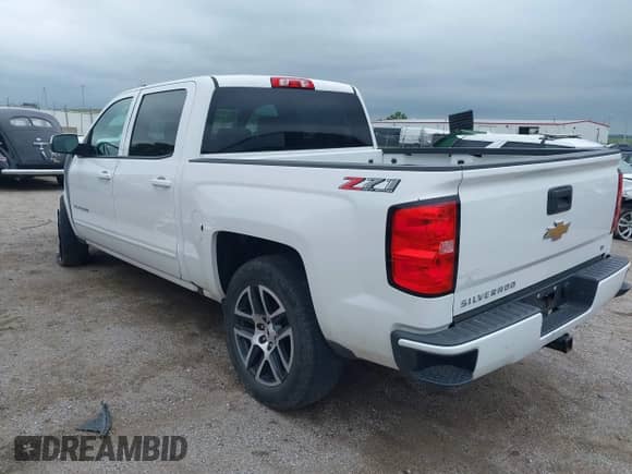 2018 Chevrolet Silverado 1500 LT z VIN 3GCUKREC8JG251610, wystawiony jako IAAI lot #42805361 z przebiegiem 111 857 mil mil oraz . Historia ofert i sprzedaży dostępna na DreamBid. Obrazek 3.