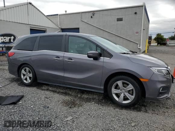 2019 Honda Odyssey EX with VIN 5FNRL6H53KB034326, listed as a Copart auction lot 81012105 with 90,266 mi miles and Salvage title. Bid and sale history available at DreamBid. Image 4.