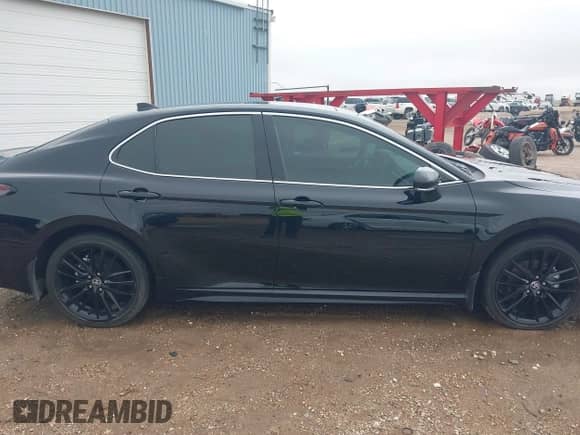 2023 Toyota Camry XSE with VIN 4T1K61AK4PU828838, listed as a IAAI auction lot 43087534 with 19,542 mi miles and . Bid and sale history available at DreamBid. Image 13.