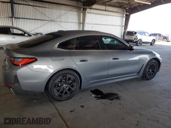 2024 BMW i4 eDrive35 with VIN WBY43AW05RFS37971, listed as a Copart auction lot 70945365 with 40,946 mi miles and Salvage title. Bid and sale history available at DreamBid. Image 3.