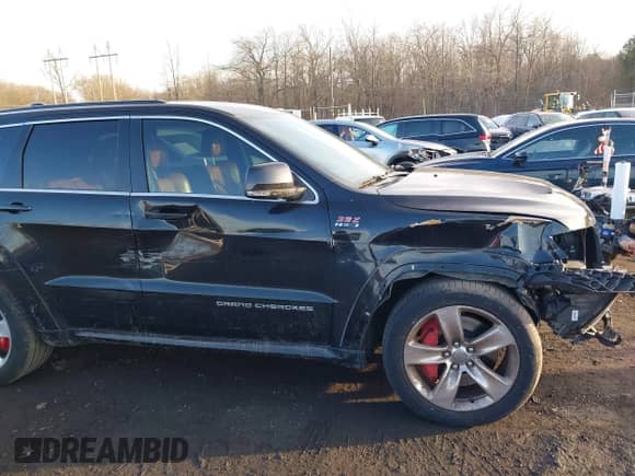 2015 Jeep Grand Cherokee SRT with VIN 1C4RJFDJ6FC744087, listed as a IAAI auction lot 41500653 with 130,530 mi miles and . Bid and sale history available at DreamBid. Image 20.
