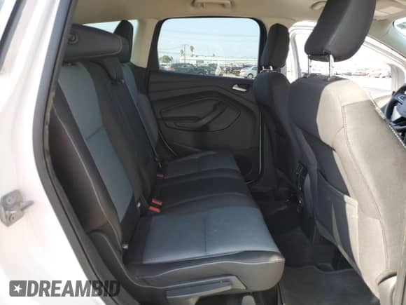 2018 Ford Escape SE with VIN 1FMCU9GDXJUB59001, listed as a Copart auction lot 84057235 with 60,517 mi miles and Salvage title. Bid and sale history available at DreamBid. Image 11.