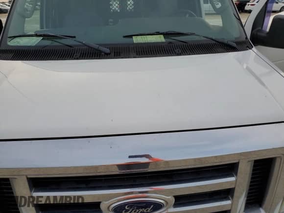 2009 Ford Econoline Cargo Commercial с VIN 1FTNE14W69DA79580, выставлен на аукционе Copart как лот 77773694 с пробегом Не указан миль и Списание • Salvage title. История ставок и продаж доступна на DreamBid. Изображение 11.