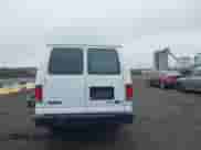 2012 Ford Econoline Cargo Commercial z VIN 1FTNS2EWXCDA42892, wystawiony jako IAAI lot #42219642 z przebiegiem 199 728 mil mil oraz . Historia ofert i sprzedaży dostępna na DreamBid. Obrazek 16.