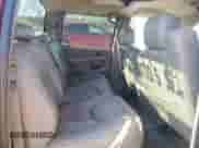 2005 GMC Sierra 1500 SLE with VIN 2GTEK13T951274630, listed as a Copart auction lot 82576965 with 294,879 mi miles and Salvage title. Bid and sale history available at DreamBid. Image 10.