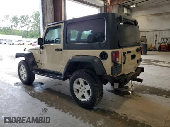 2011 Jeep Wrangler Sport z VIN 1J4AA2D19BL548655, wystawiony jako Copart lot #70868835 z przebiegiem 116 398 mil mil oraz Nie do naprawy • Non repairable. Historia ofert i sprzedaży dostępna na DreamBid. Obrazek 2.