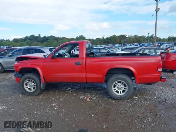 2004 Dodge Dakota with VIN 1D7GG36N14S504765, listed as a IAAI auction lot 43310869 with 143,838 mi miles and . Bid and sale history available at DreamBid. Image 14.