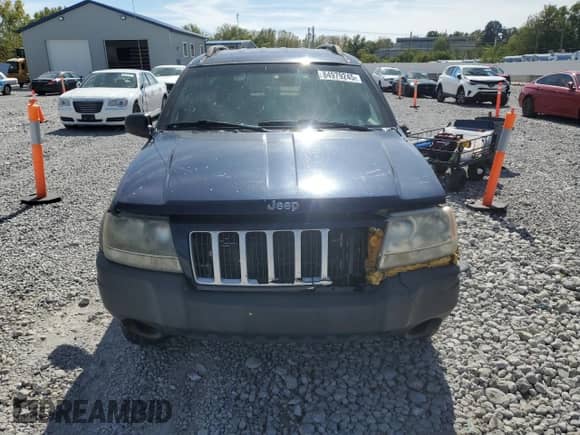 2004 Jeep Grand Cherokee Laredo with VIN 1J4GX48S14C220124, listed as a Copart auction lot 84979245 with 237,797 mi miles and Salvage title. Bid and sale history available at DreamBid. Image 5.